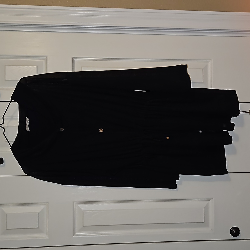 Swimsuit cover up with hood.